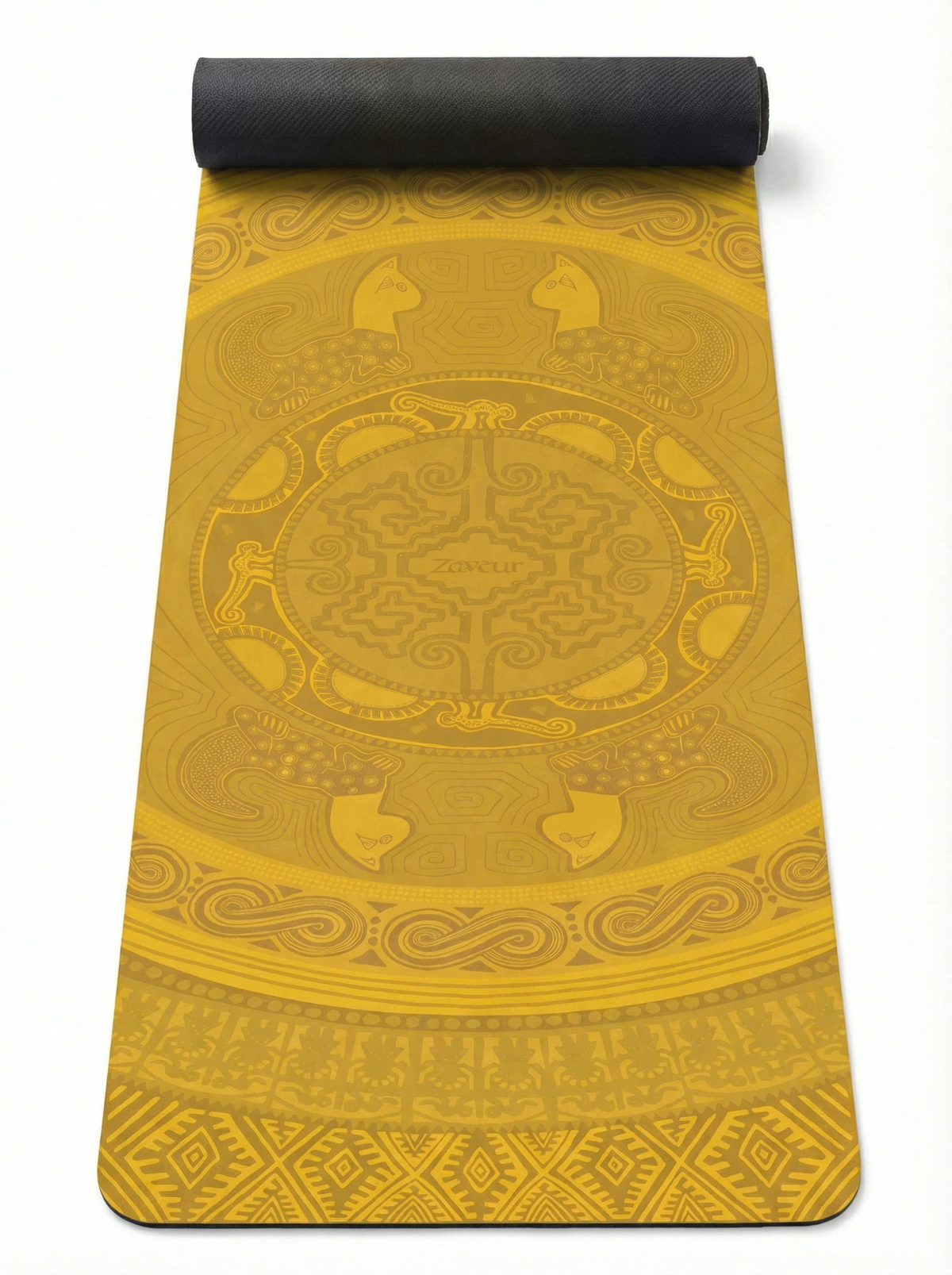 Colombian Dreams yoga mat in mustard yellow, partly rolled, tone-on-tone mandala with animal figures