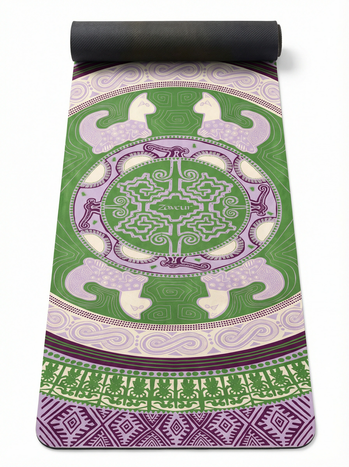 Colombian Dreams yoga mat in green and lilac, partly rolled, a mandala medallion framed by four cats