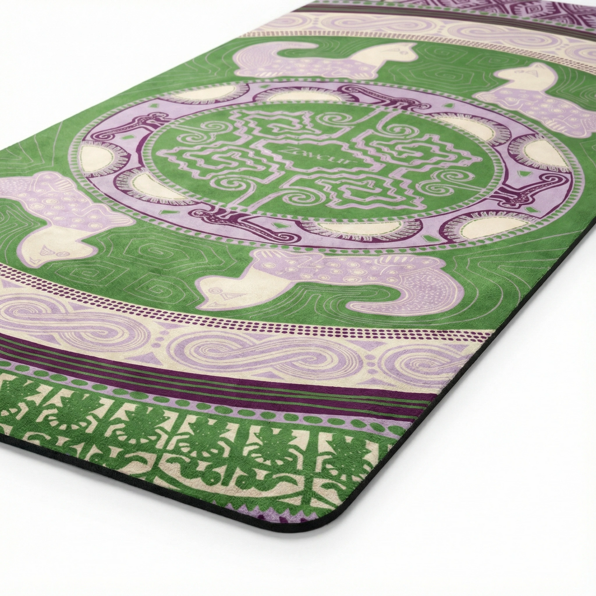 Close view of the green Colombian Dreams yoga mat: lilac cats around a mandala medallion, wave and leaf borders