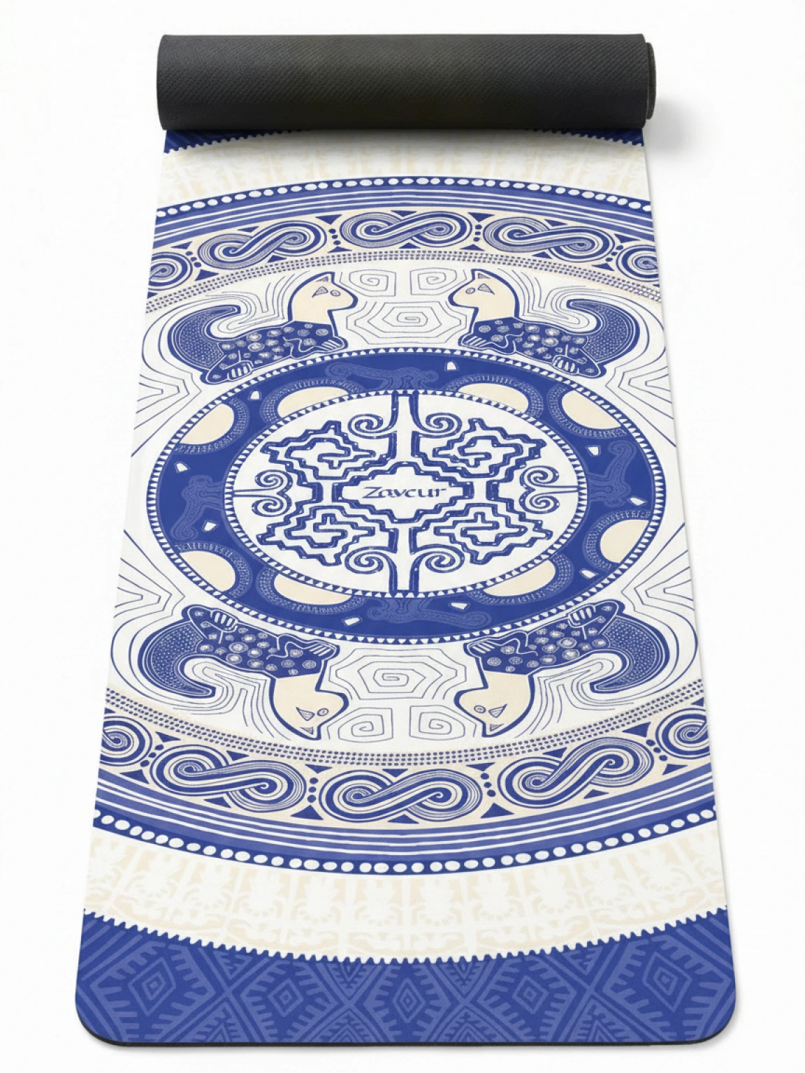 Colombian Dreams blue and white mandala yoga mat partly rolled, with line-art turtles, cats and Zaveur logo