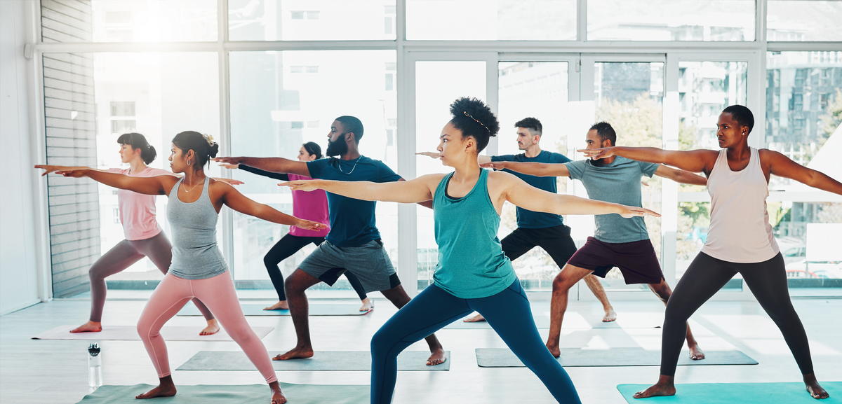 Person performing warrior yoga pose